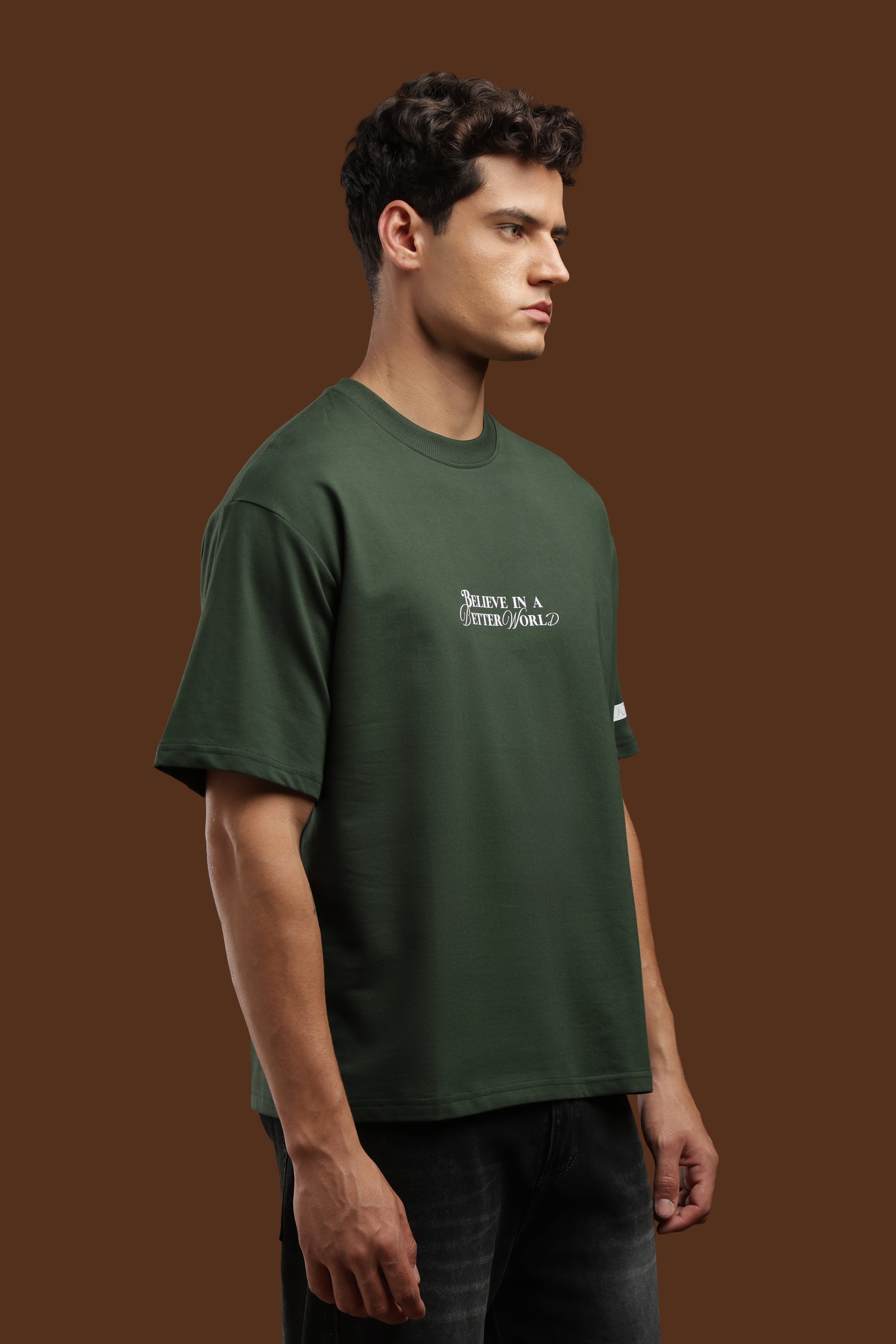 Better World Printed Oversized T-Shirt shown on a model, featuring a relaxed fit and bold design.