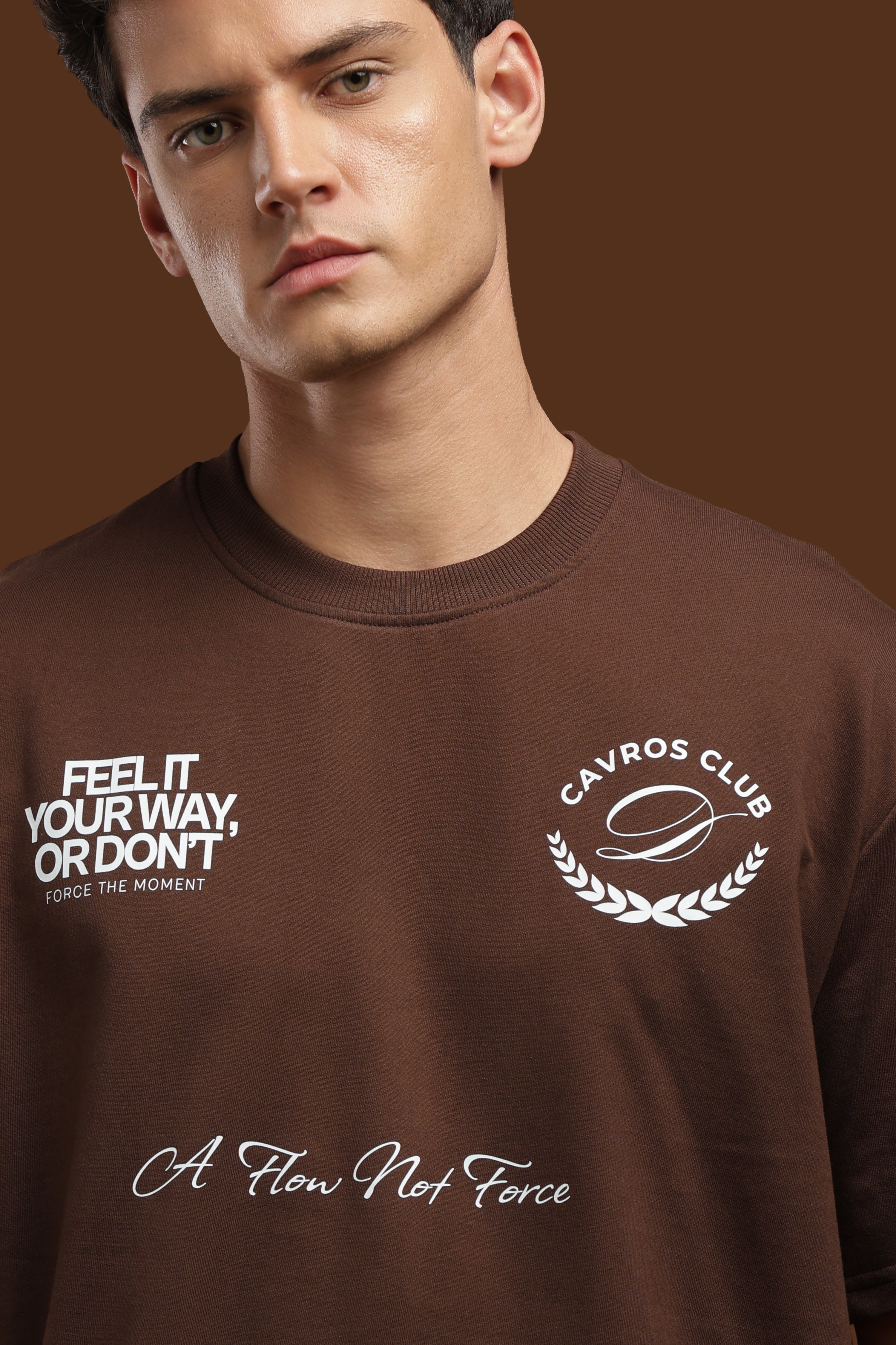 Oversized Fit Club Printed T-Shirt featuring Cavros Club graphics on a brown background.