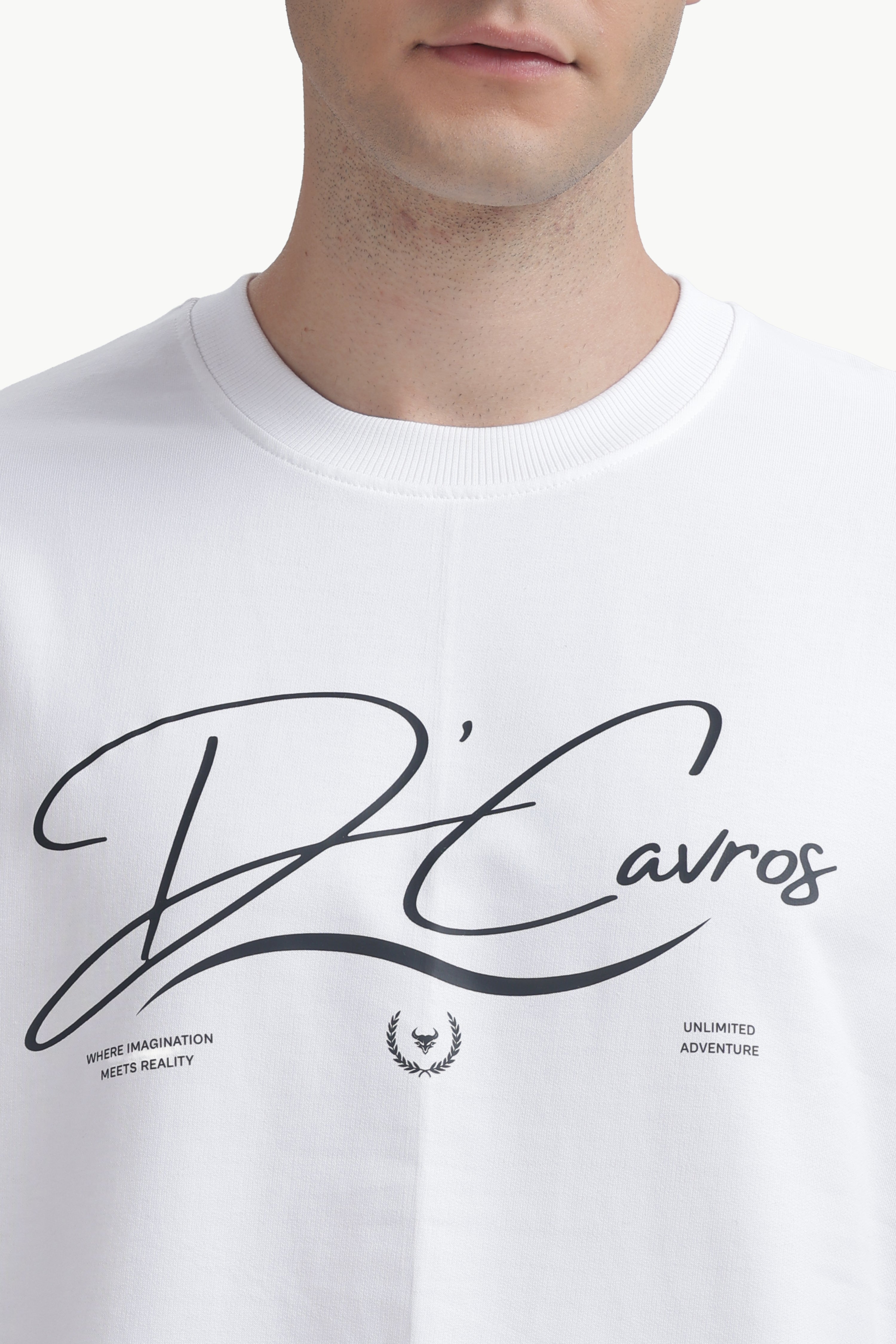 Community Capsule Graphics Tee featuring bold typography and clean graphic style on a white cotton background.