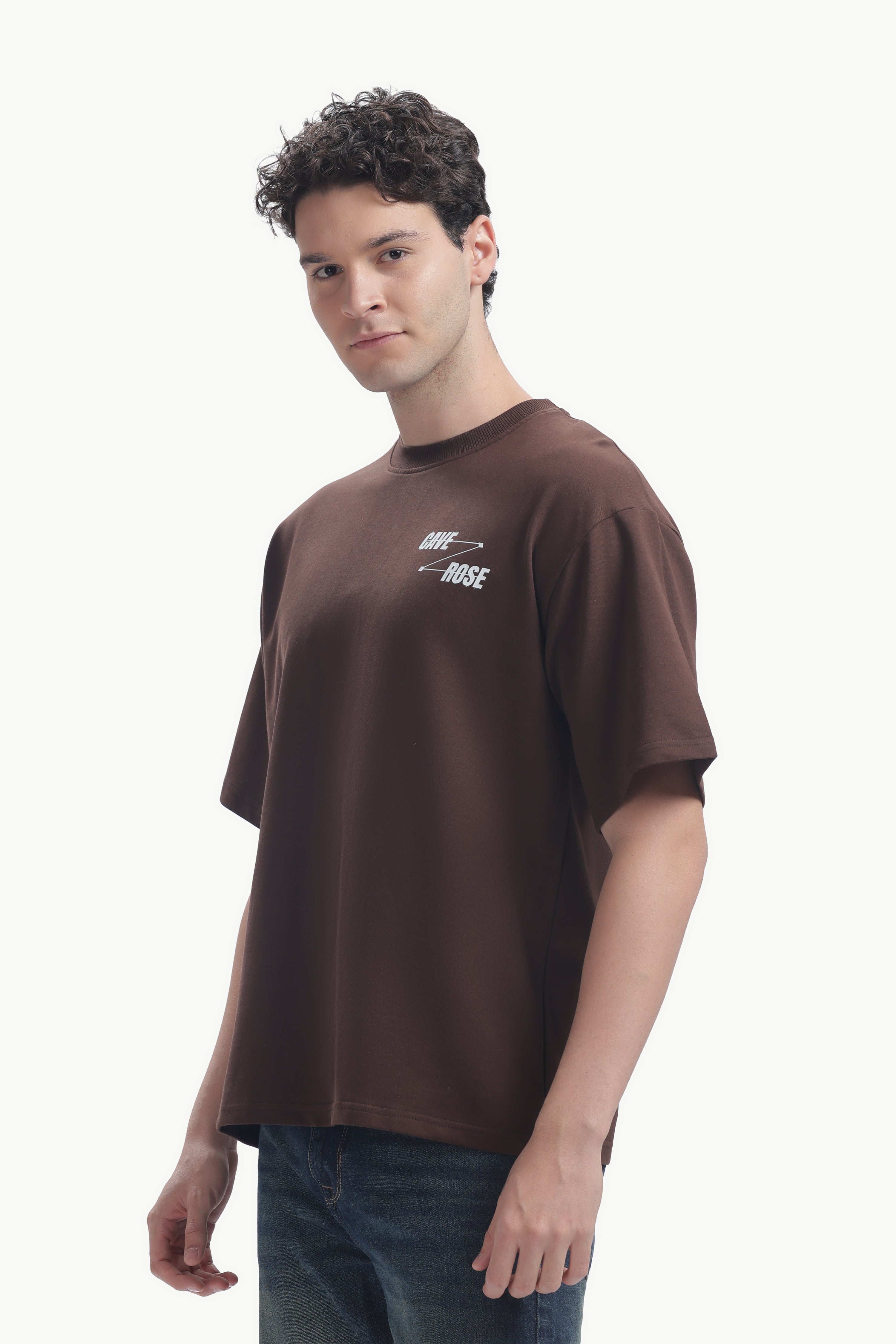 Cave-Rose Creative Studio Graphics Tee worn by a model, showcasing bold typography and relaxed fit.