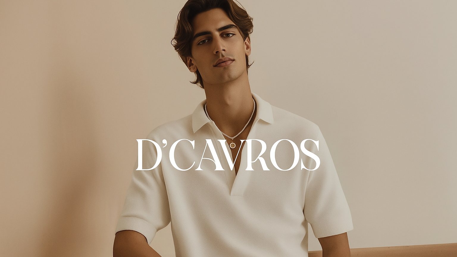 Man wearing a white polo shirt with 'D'Cavros' branding on a beige background