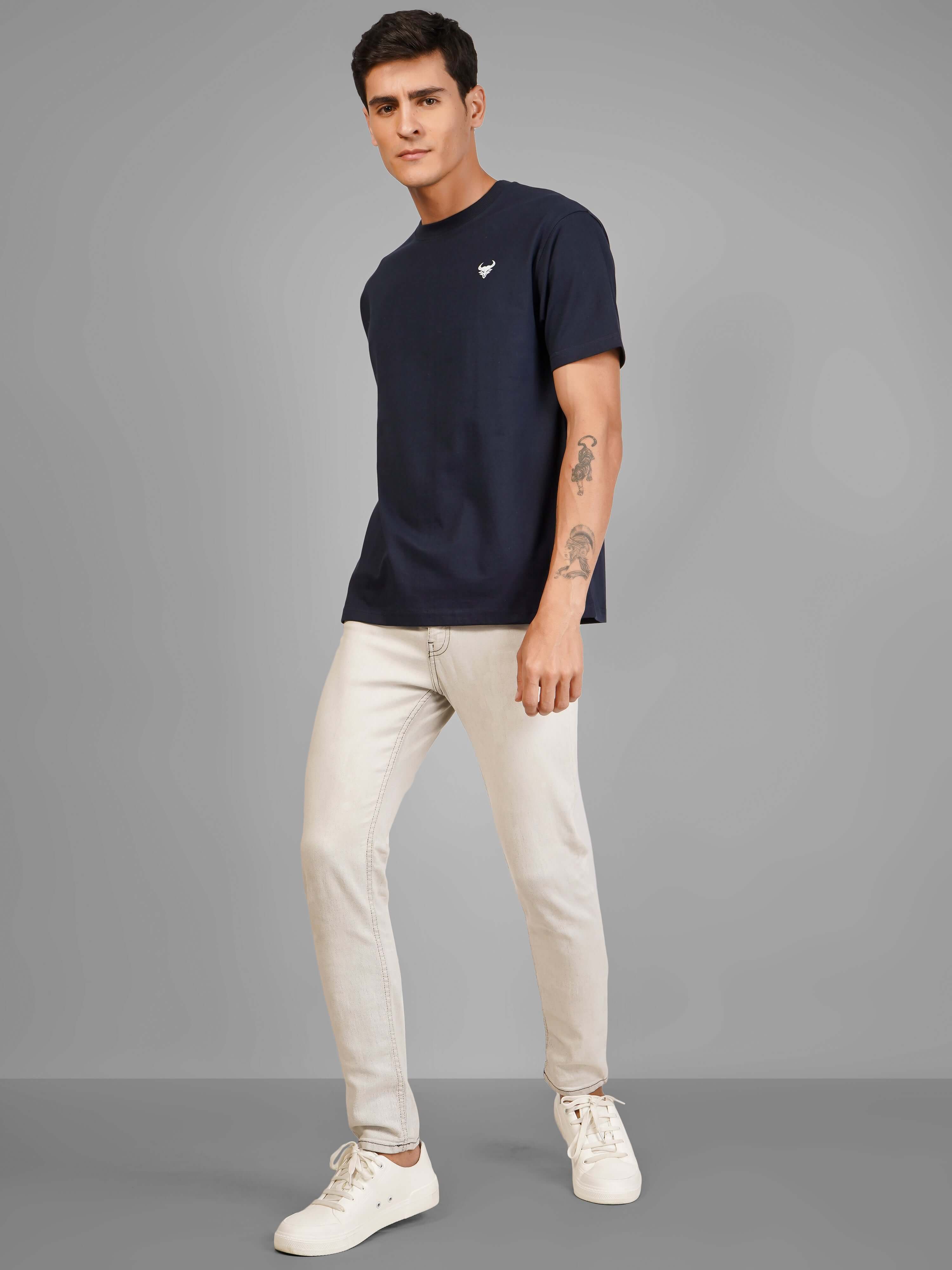 The Skull Creature premium t-shirt displayed on a model, showcasing minimalist design and relaxed fit.