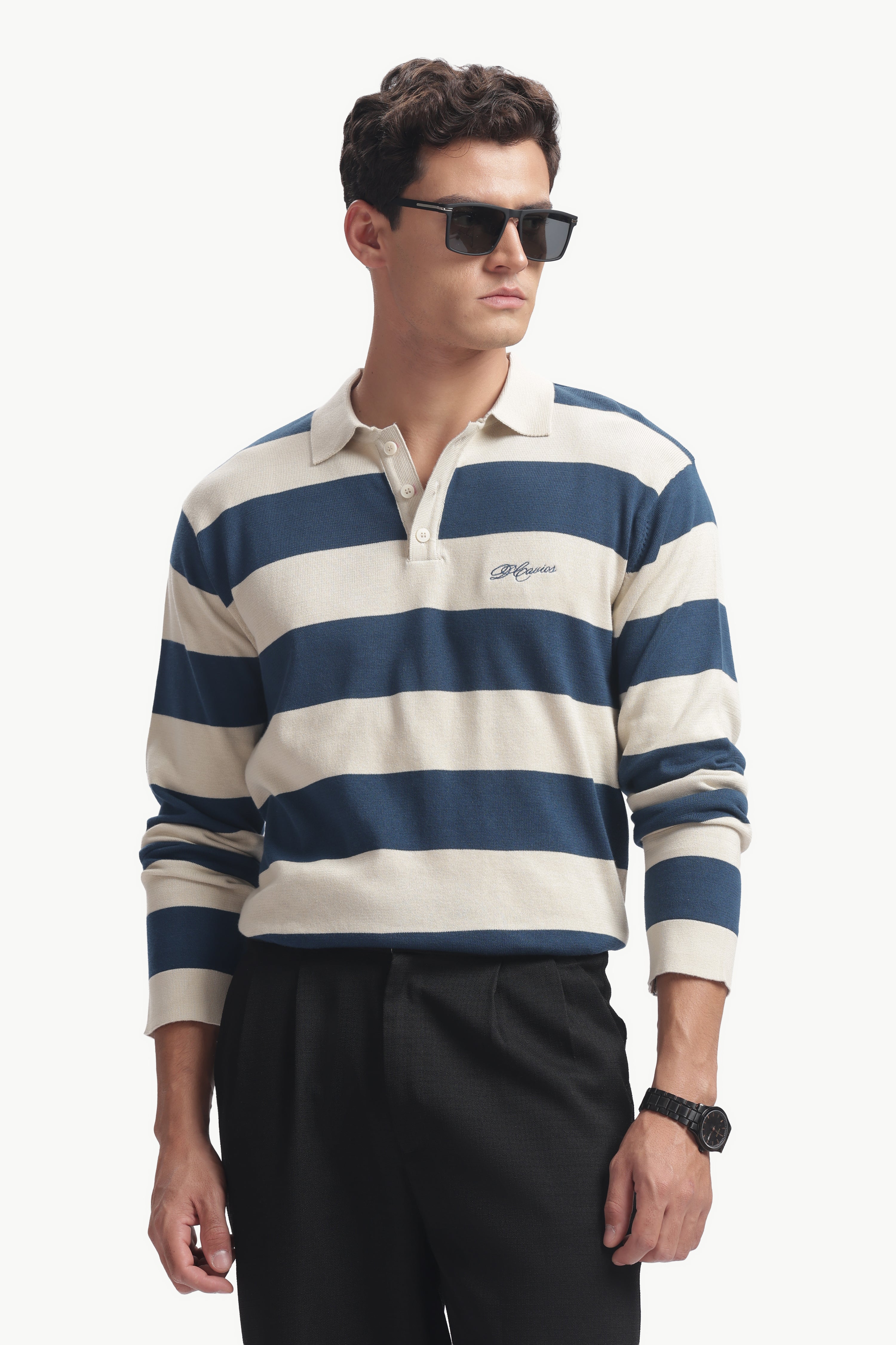 Model wearing Regular Fit Cotton-Knit Rugby Shirt with bold stripes and structured collar, styled for smart casual wear.