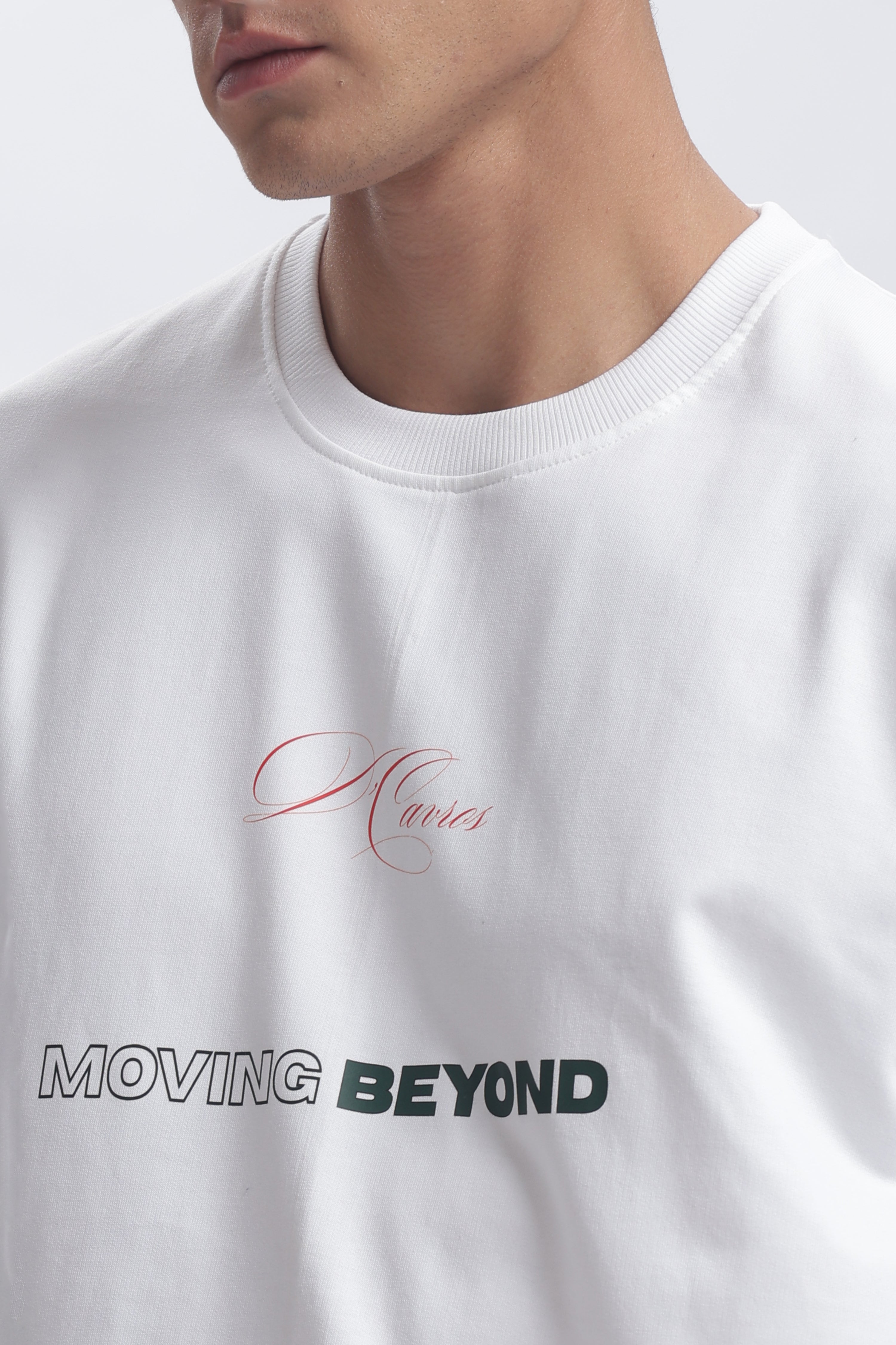 Model wearing a Loose Fit Solid Printed T-Shirt showcasing a unique typography design.