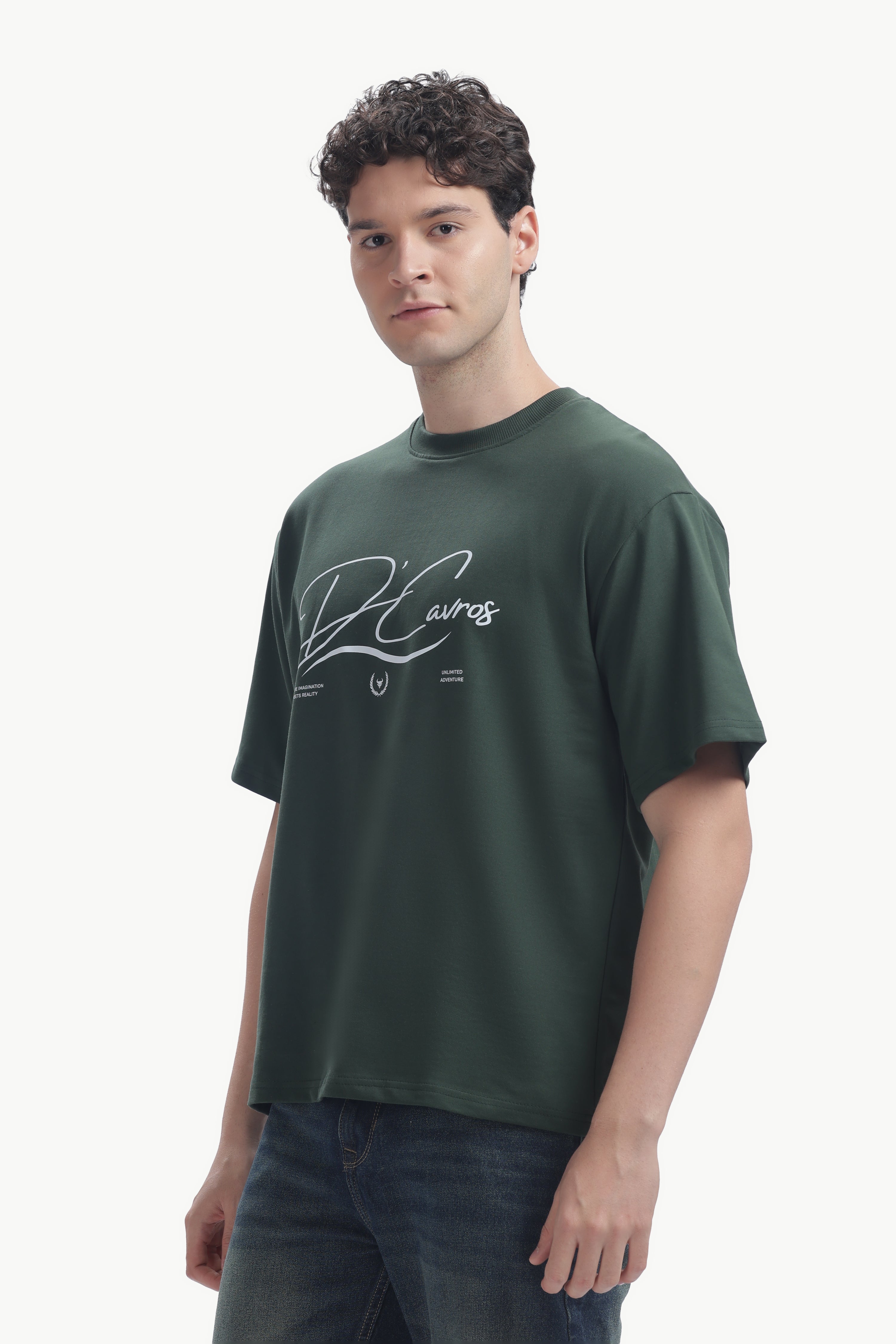 Model wearing the Community Capsule Graphics Tee featuring bold typography and a relaxed fit.