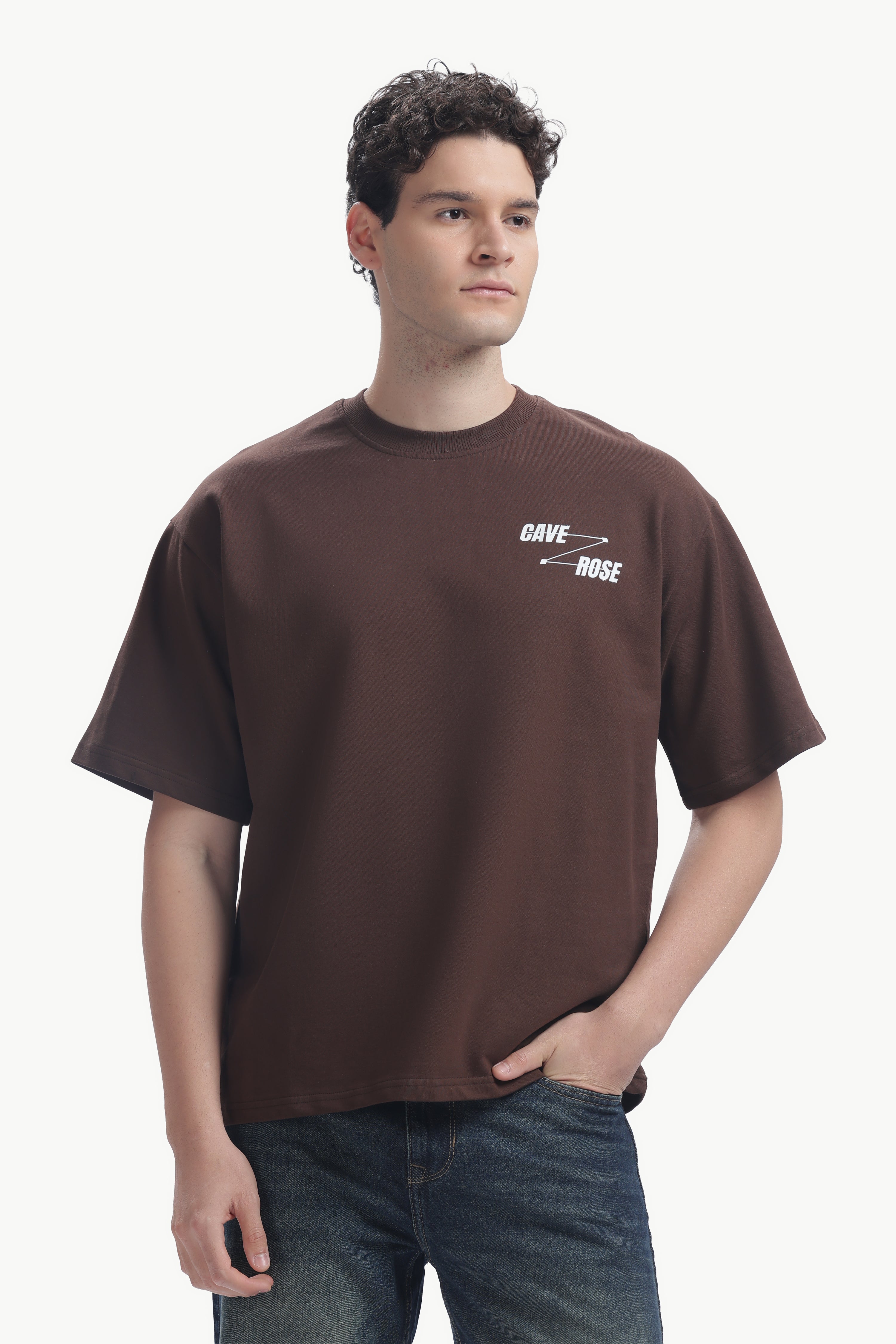 Cave-Rose Creative Studio Graphics Tee on a model, showcasing bold typography and relaxed fit.